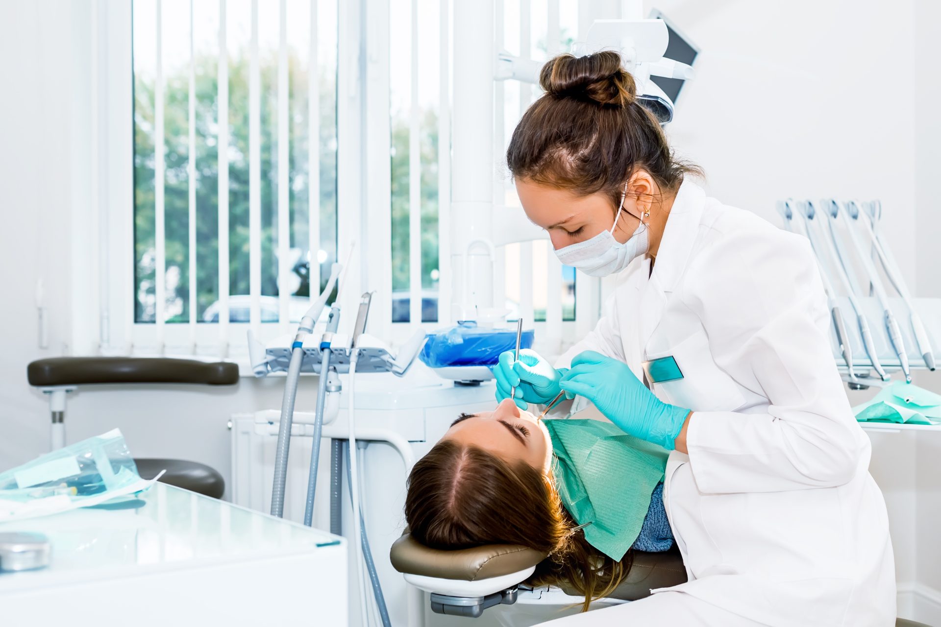 patient getting a dental cleaning at the dentist