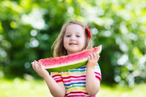 girl eating watermelon